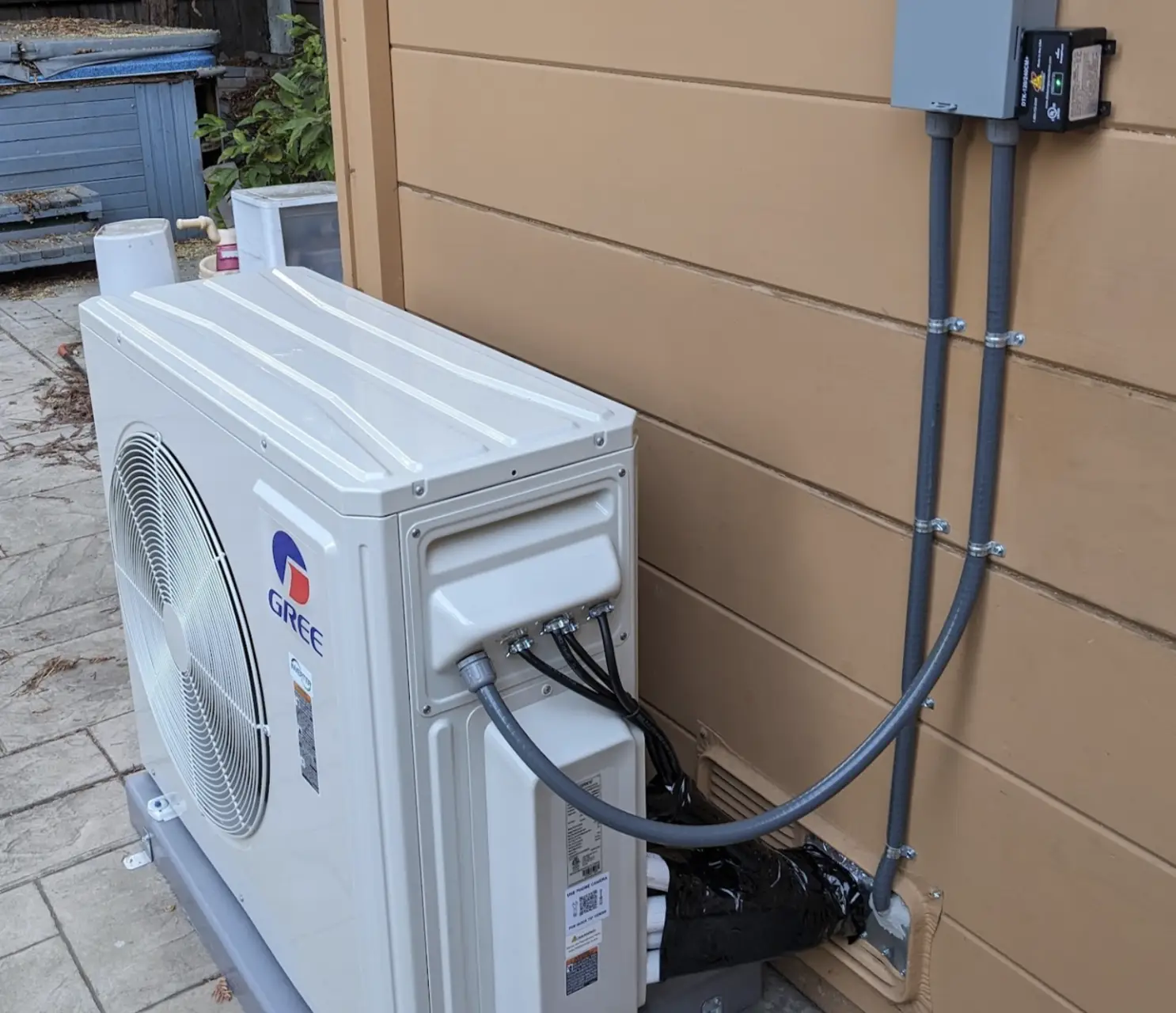 Heat pump installation on house exterior — Electric Air, serving Pinole, CA